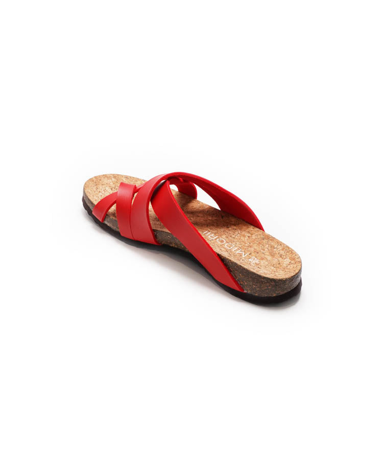 Red sandal with cork sole on a white background