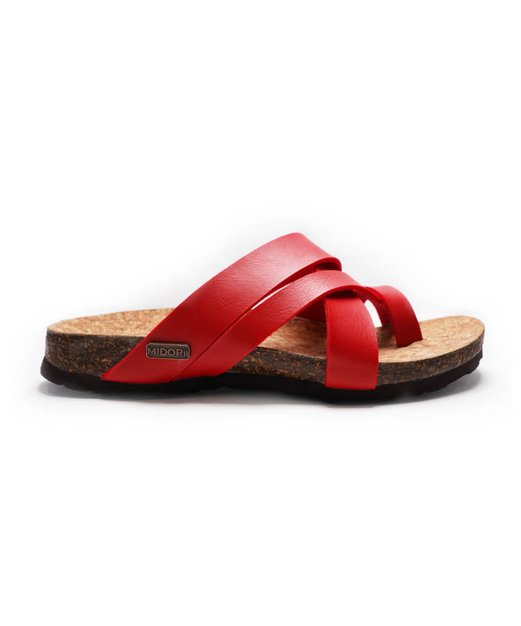 Red sandal with cork sole on a white background