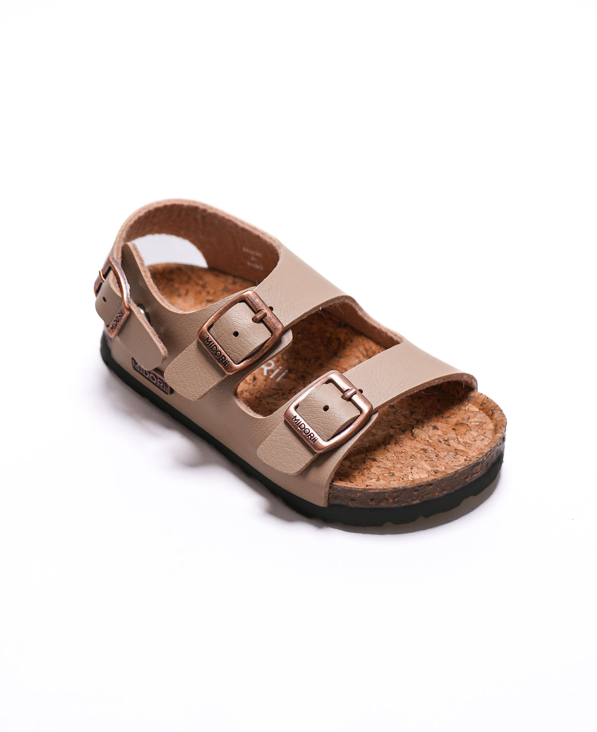 A single children's double-strap sandal in beige faux leather with adjustable metal buckles, a cork footbed, and a black outsole, shown on a white background.
