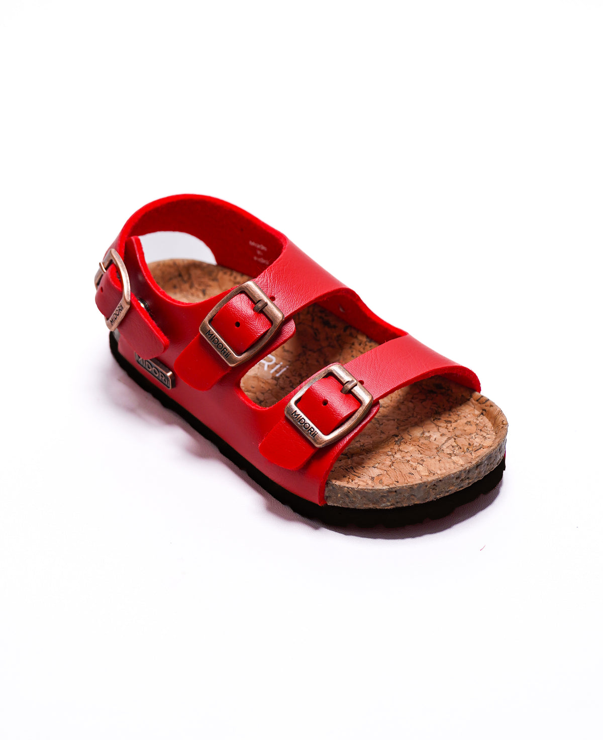 A red double-strap sandal with silver-tone buckle closures and a natural cork footbed, shown on a plain white background.
