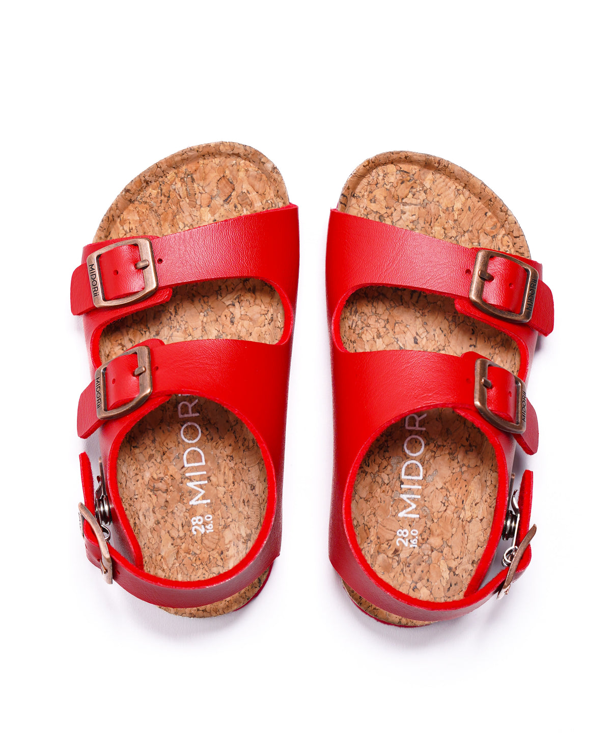 A pair of red double-strap sandals with cork soles and silver-tone buckles, photographed from a top-down view on a white background.