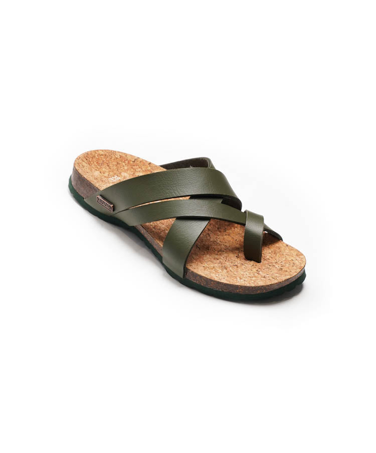 Green sandal with cork sole on a white background